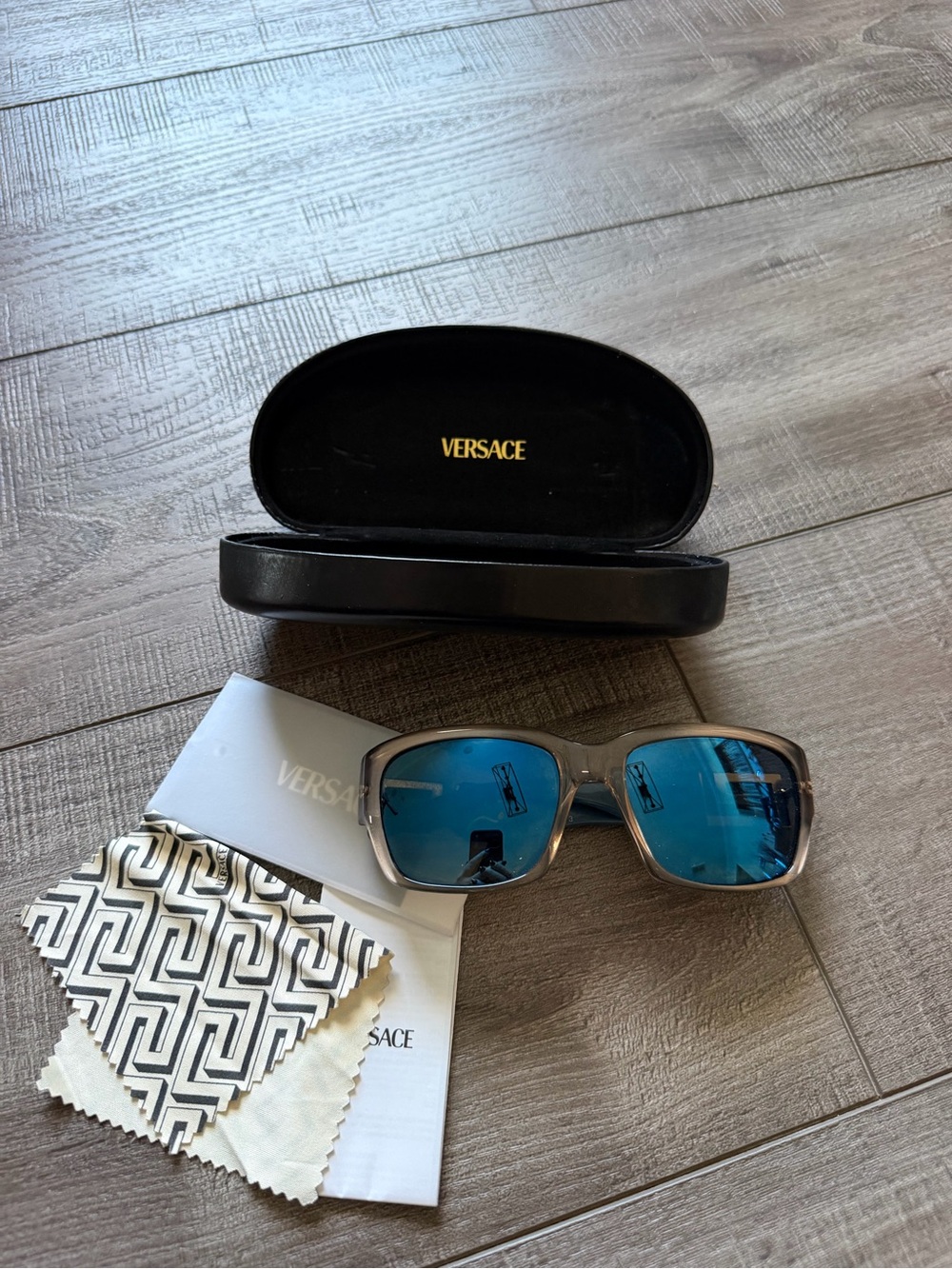 Versace Sunglasses with Blue Mirrored Lenses and Translucent Gray Frame